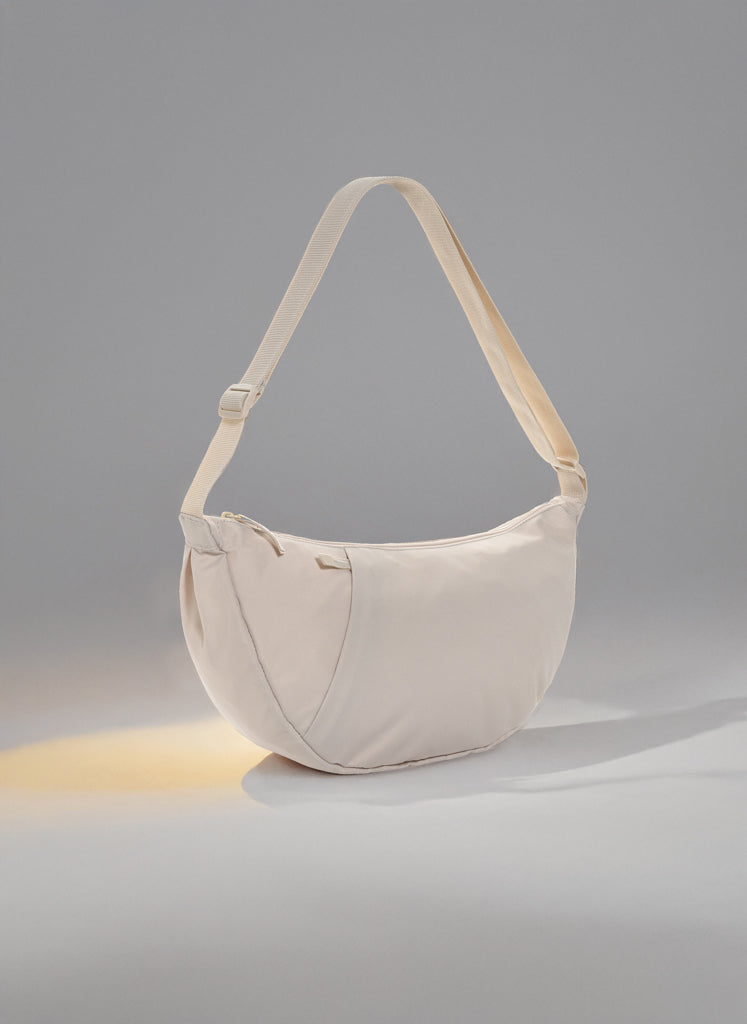 Crescent XL AWARE™ RPET half moon sling bag