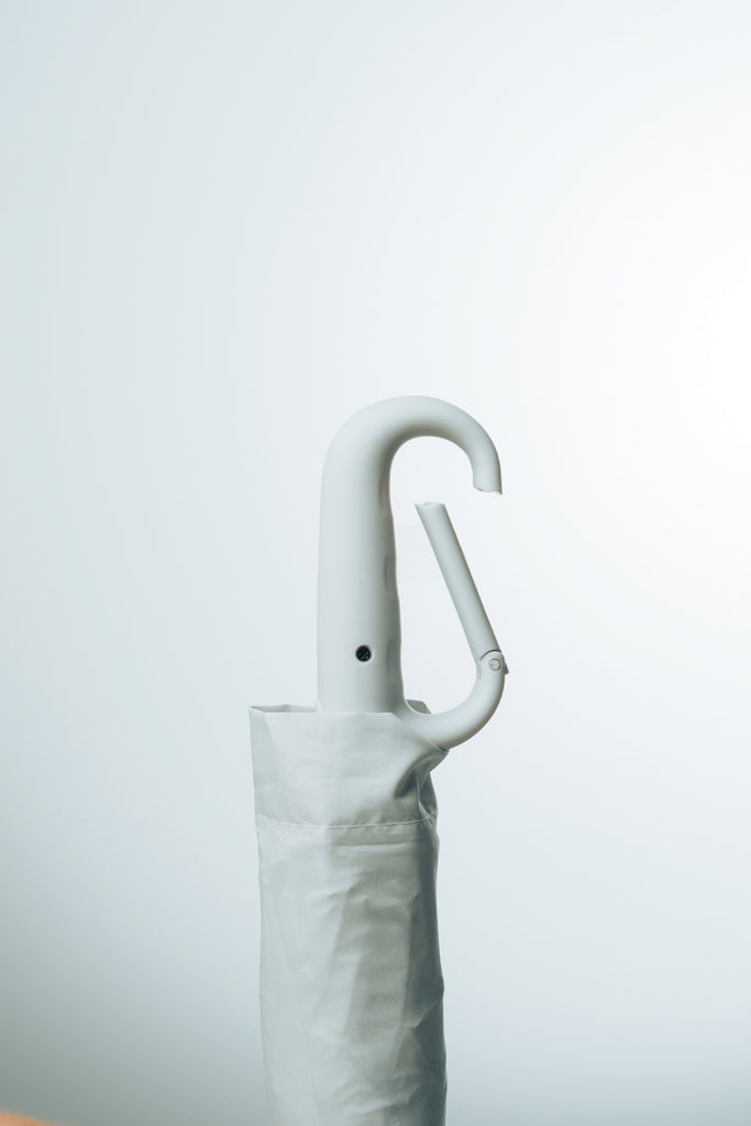 Yara 21" AWARE™ RPET solid colour umbrella with carabiner