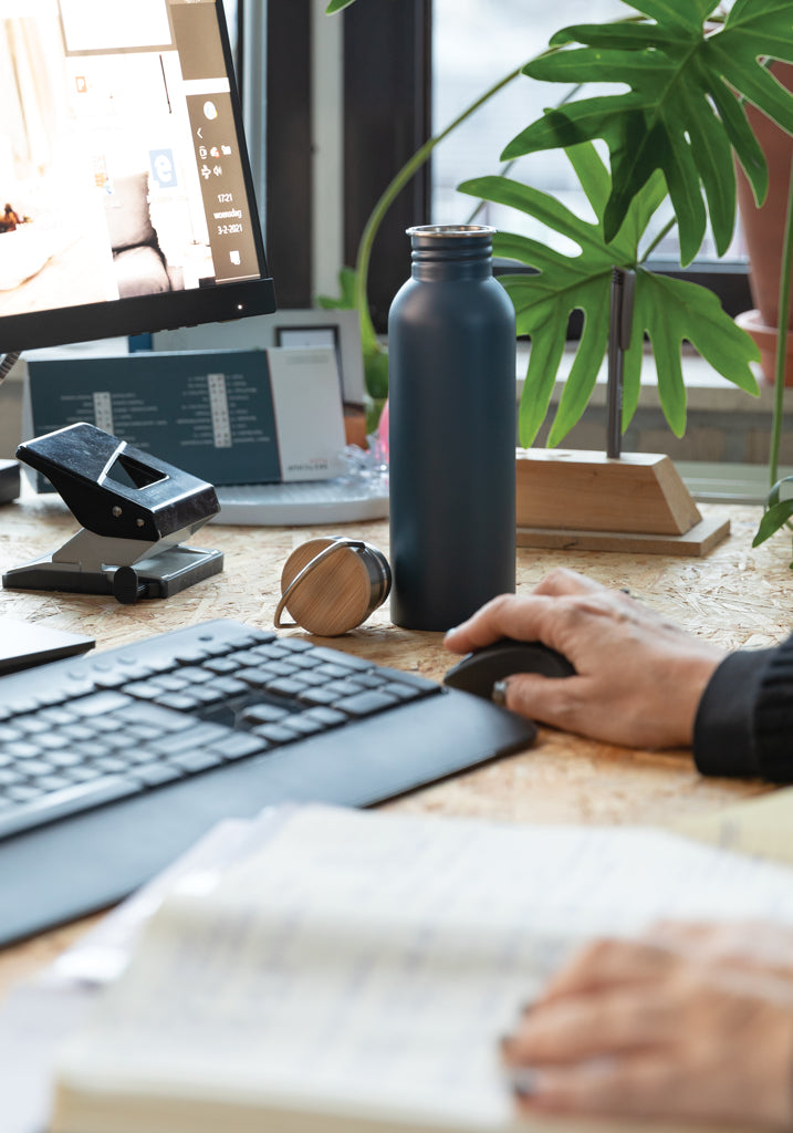 Modern stainless steel bottle with bamboo lid