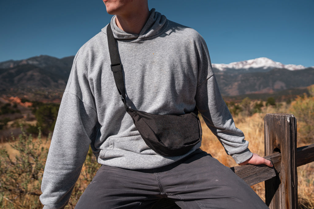 Crescent AWARE™ RPET half moon sling bag
